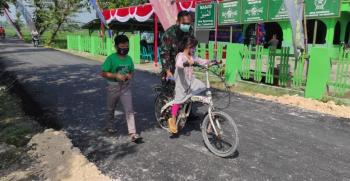 Manfaat Jalan Aspal Program TMMD 110 Bojonegoro Bagi Anak-Anak Dua Desa Di Tambakrejo